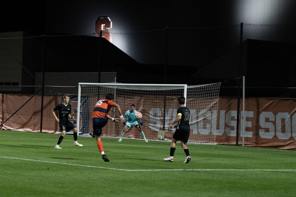 Graduate Forward Daniel Diaz Bonilla takes a shot on goal in the late minutes of a 2-0 victory versus Providence at SU Soccer Stadium on Thursday August 25, 2023. Photo by Matt Hofmann.