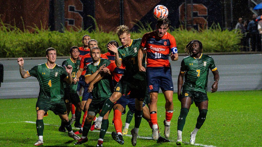 Regardless of the downpour, the SU Men's Soccer team perseveres in their game. 