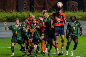 Regardless of the downpour, the SU Men's Soccer team perseveres in their game.