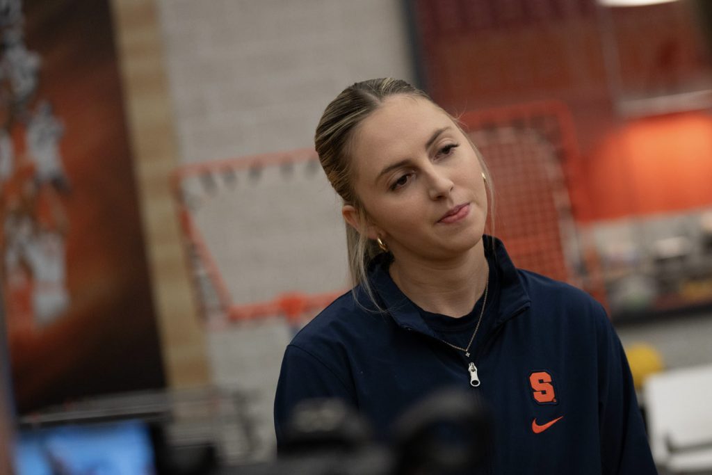 Georgia Woolley answers reporters questions regarding the teams expectations for the upcoming season at the Syracuse women's basketball media day on Oct. 13, 2023, in the Carmelo Center.
