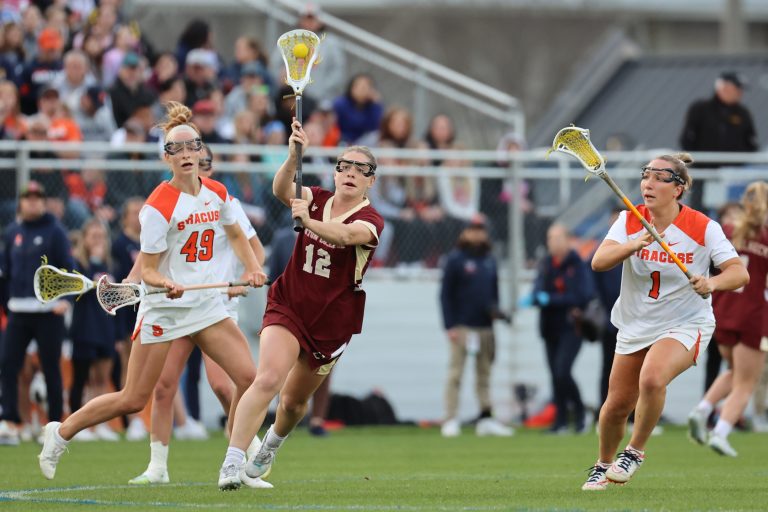SYRACUSE, NY - APRIL 20: Cassidy Weeks #12 of Boston College Eagles passes the ball against the Syracuse Orange during the first quarter on April 20, 2023 in Syracuse, New York. (Photo by Isaiah Vazquez/Getty Images)