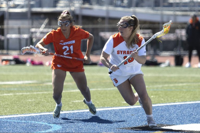 Syracuse attack Meaghan Tyrrell tries to outrun first-year program Clemson's defender on April 8 at Cicero-North Syracuse High School.