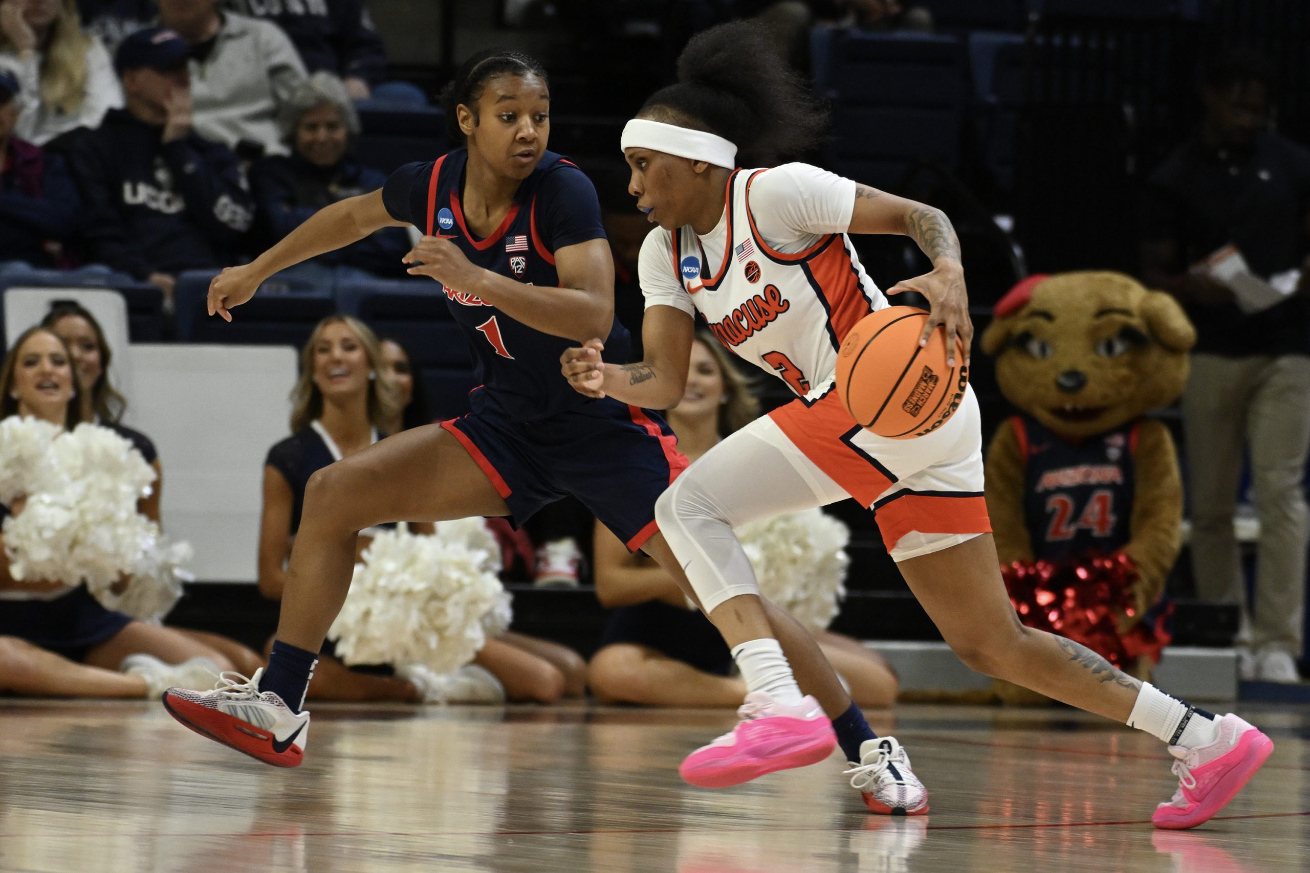 Courtney Blakely #1 of the University of Arizona Wildcats defends Dyaisha Fair #2 of the Syracuse University Orange during the first round of the 2024 NCAA Women's Basketball Tournament held at Harry A. Gampel Pavilion on March 23, 2024 in Storrs, Connecticut.