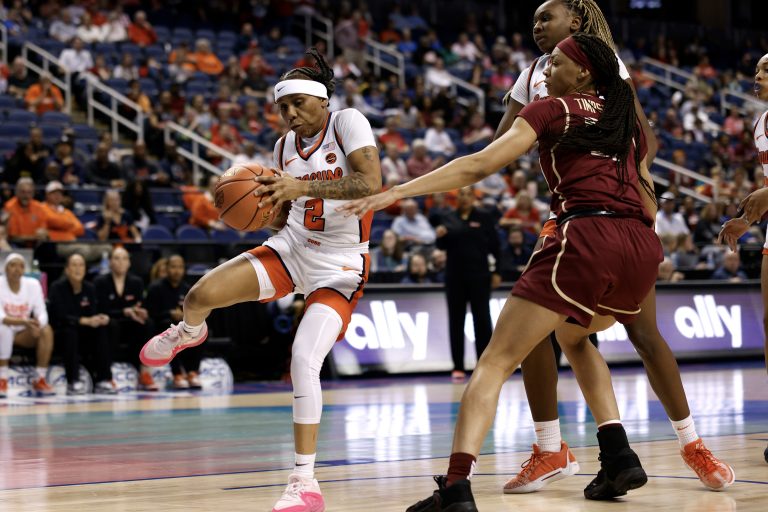 Dyaisha Fair #2 of the Syracuse Orange gets a defensive rebound against the Florida State Seminoles during the first half of the game in the Quarterfinals of the ACC Women's Basketball Tournament at Greensboro Coliseum on March 8, 2024 in Greensboro, North Carolina.