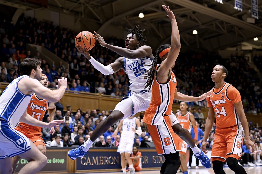 Mark Mitchell #25 of the Duke Blue Devils drives to the basket against s #13 of the Syracuse Orange during the first half of the game at Cameron Indoor Stadium on January 02, 2024 in Durham, North Carolina.