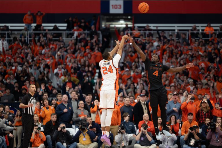 Syracuse Guard Quadir Copeland (#24) extends to Orange's undefeated streak at home with a buzzer beating three-pointer