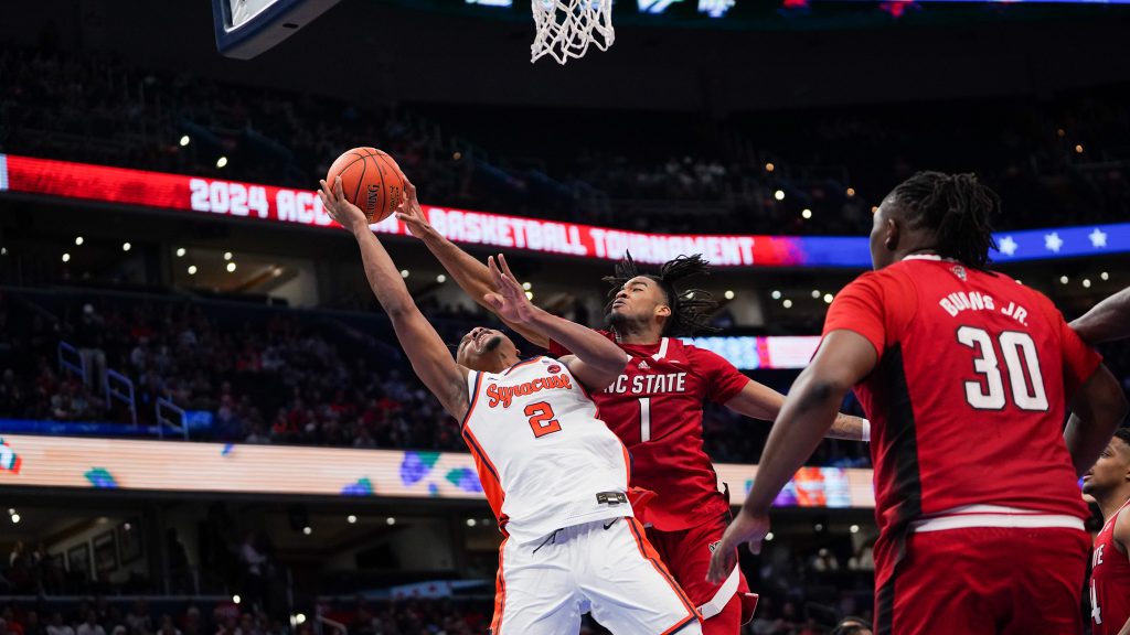 Sophomore guard J.J. Starling faces a stiff defense during the Syracuse-North Carolina State second-round game of the ACC men's basketball tournament on March 13, 2024, at the Capital One Arena in Washington, D.C.