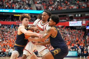 Syracuse's Chris Bell is fouled after pulling down an important rebound in the final minute of Saturday's game vs. Notre Dame.