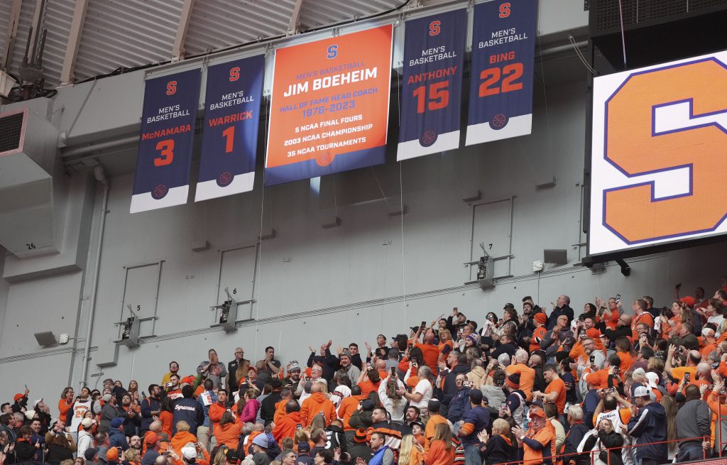 A new banner is displayed in the rafters highlighting Jim Boeheim’s career at Jim Boeheim Day at JM Wireless Dome in Syracuse, N.Y., Saturday, Feb. 24, 2024.