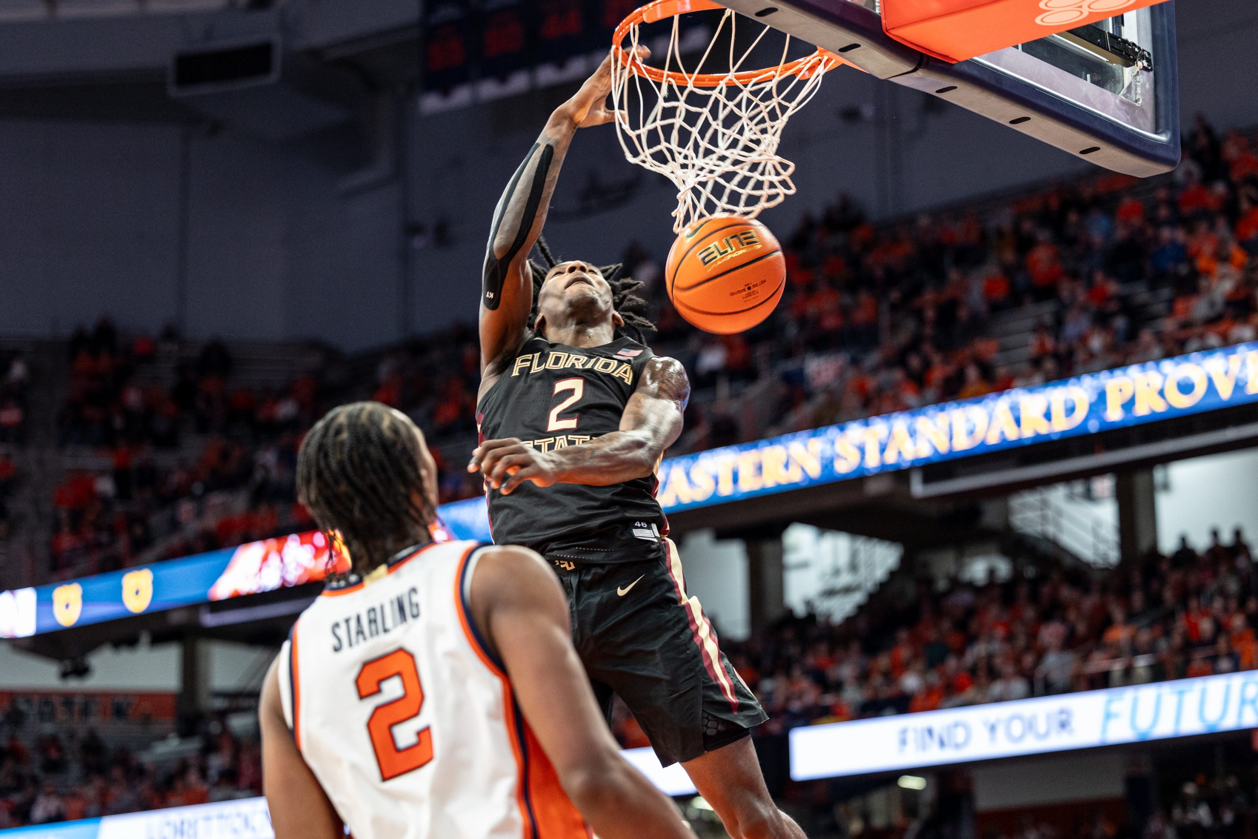 FSU Forward Jamir Watkins (#2) throws down a thunderous dunk to add on to the Seminole lead late in the second half during the Syracuse-Florida State game on Jan. 23, 2024 in the JMA Wireless Dome.
