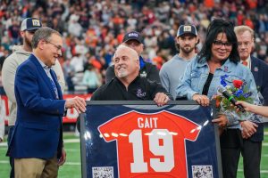 SU Lacrosse legend and three time National Champion Paul Gate celebrates with family during his jersey retirement ceremony on Saturday, April 20.