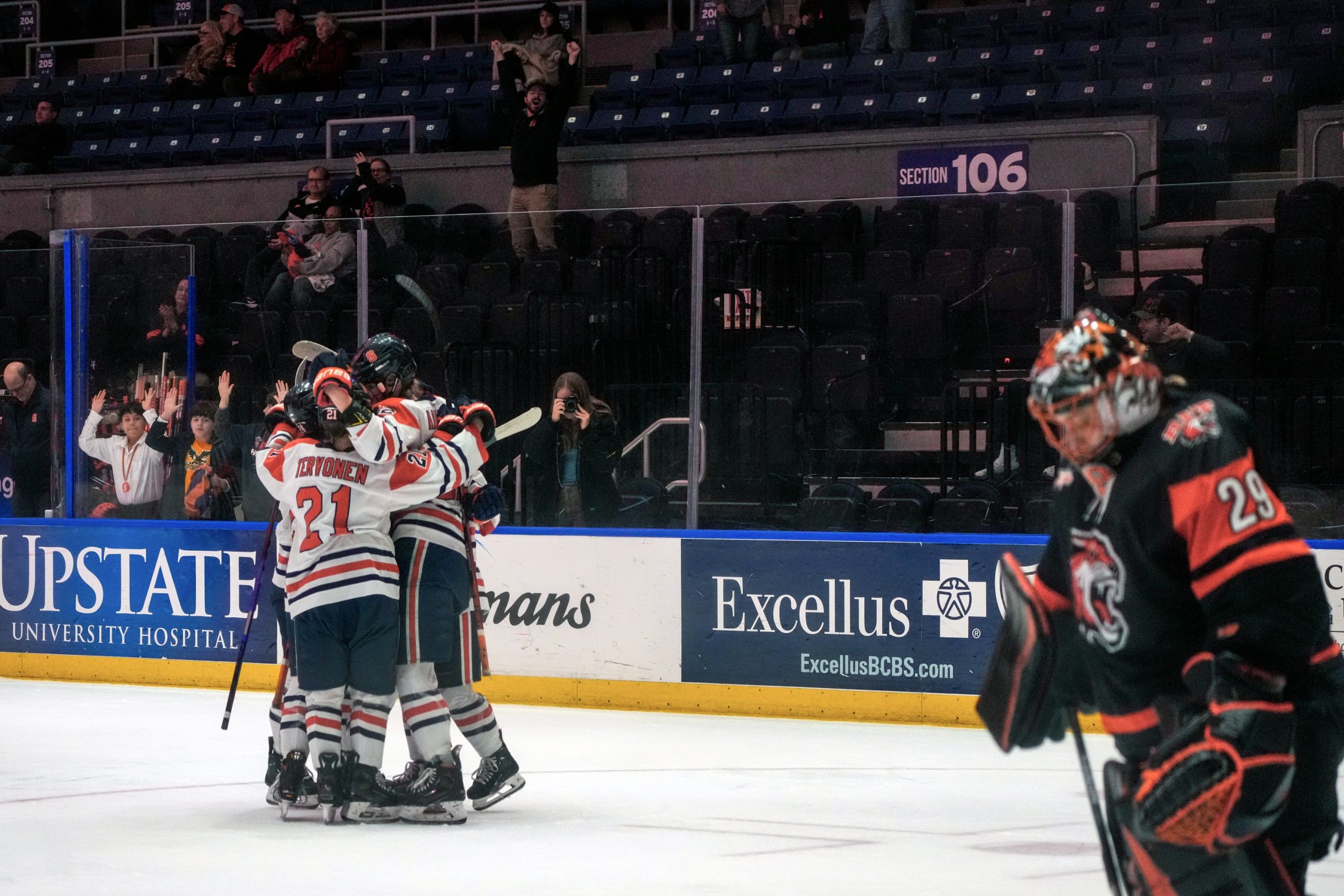 Syracuse women's ice hockey players celebrate during their game vs. the R.I.T. Tigers on Saturday, Feb. 10, 2024 in the Upstate Medical Arena in Syracuse, N.Y.