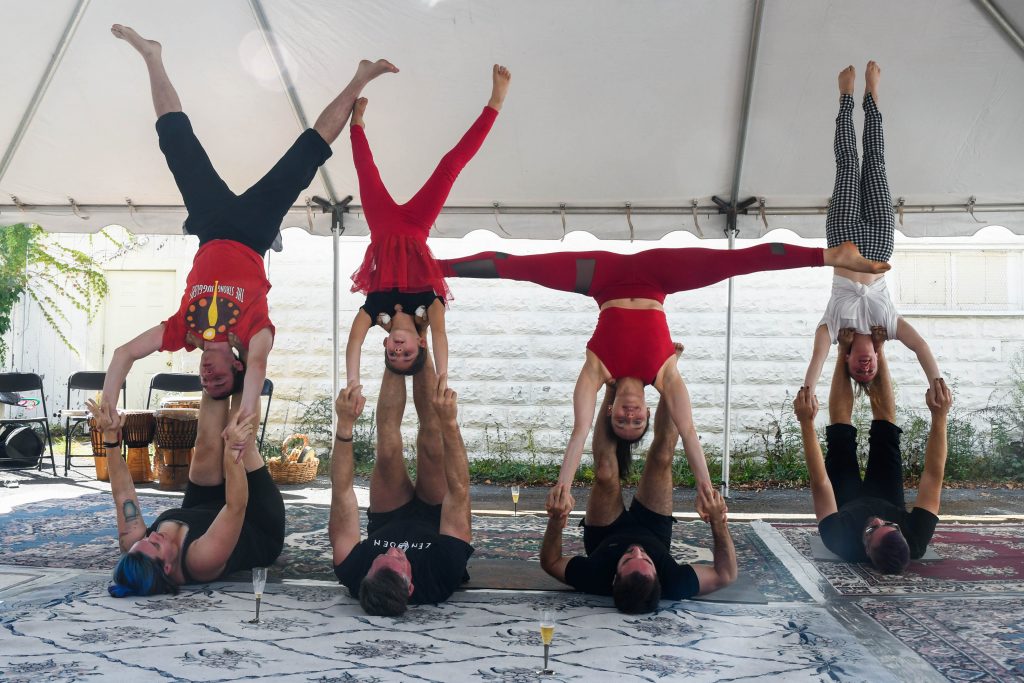 Members of the Syracuse Acrobatics and Acro Yoga Club perfoming 