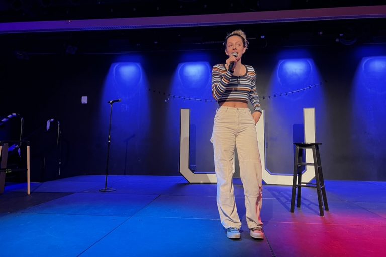 Julia DiCesare started the night with a set of her own before introducing the comedy lineup at the University Union stand-up comedy show on Saturday night.