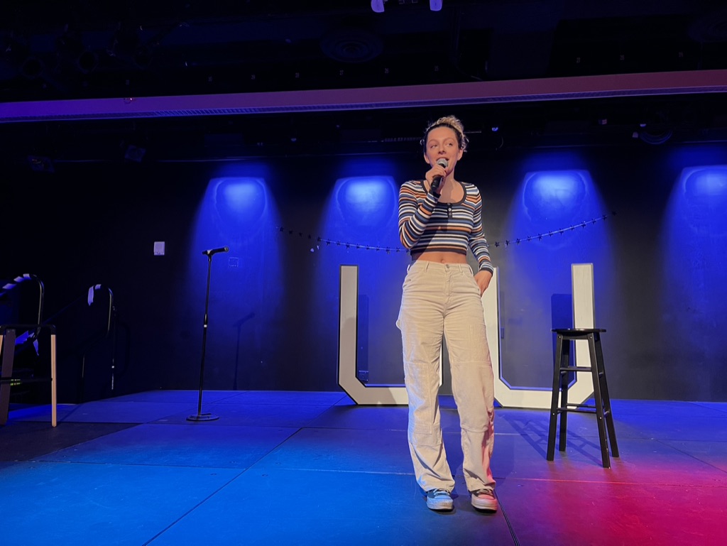 Julia DiCesare started the night with a set of her own before introducing the comedy lineup at the University Union stand-up comedy show on Saturday night.