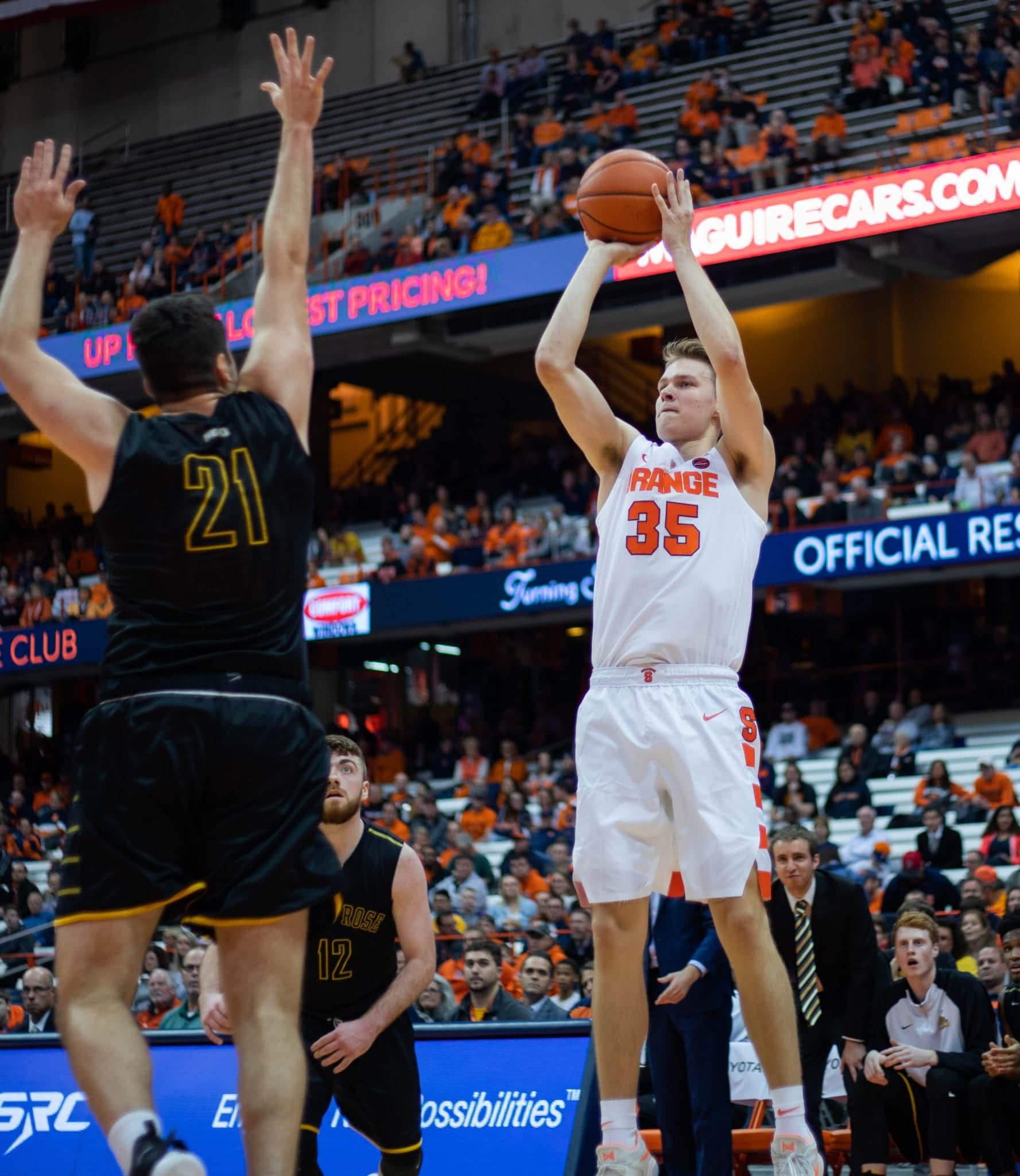 Buddy Boeheim shoots over a Saint Rose defender. Boeheim finished with 19 points in his Syracuse debut.