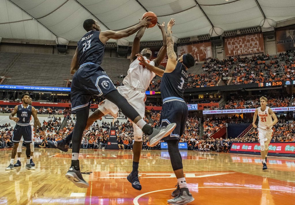 Bourama Sidibe gets blocked as he goes for up a shot during SU's loss to Old Dominion on Dec. 15, 2018, at the Carrier Dome. Sidibe ended the game without scoring.