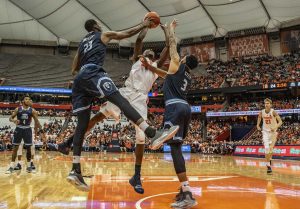 Bourama Sidibe gets blocked as he goes for up a shot during SU's loss to Old Dominion on Dec. 15, 2018, at the Carrier Dome. Sidibe ended the game without scoring.