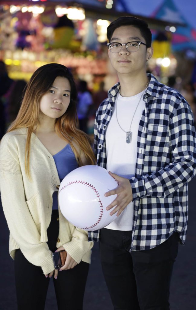 Portrait of couple Kat Dong, 18, of Brooklyn and Hongyi Ruad, 19 of Manhattan at the New York State Fair