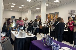 CNY Women's Summit attendees scope out the vendor hall that showcased local businesses and organizations on Friday, March 8, 2024, at the Oncenter in Syracuse.