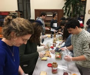 Students and faculty from different religious associations on campus came together to make PB&J and turkey sandwiches to donate to the poor at the Samaritan Center and Assumption Church Food Pantry
