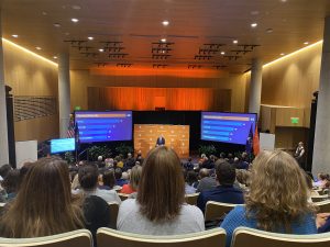 Chancellor Syverud shows the compares the number of tenured or tenure-track faculty hired by SU this year to other universities. Text