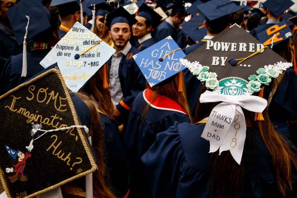 Some graduates took advantage of the option to decorate their graduation caps and with creativity thanked their parents or questioned what would happen to them now that their college years were officially over.