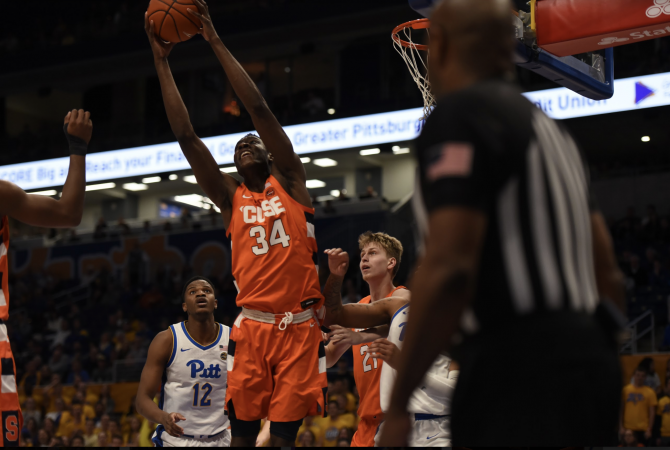 Bourama Sidibe soars for one of his 10 rebounds vs. Pitt on Wednesday, Feb. 26, 2020.