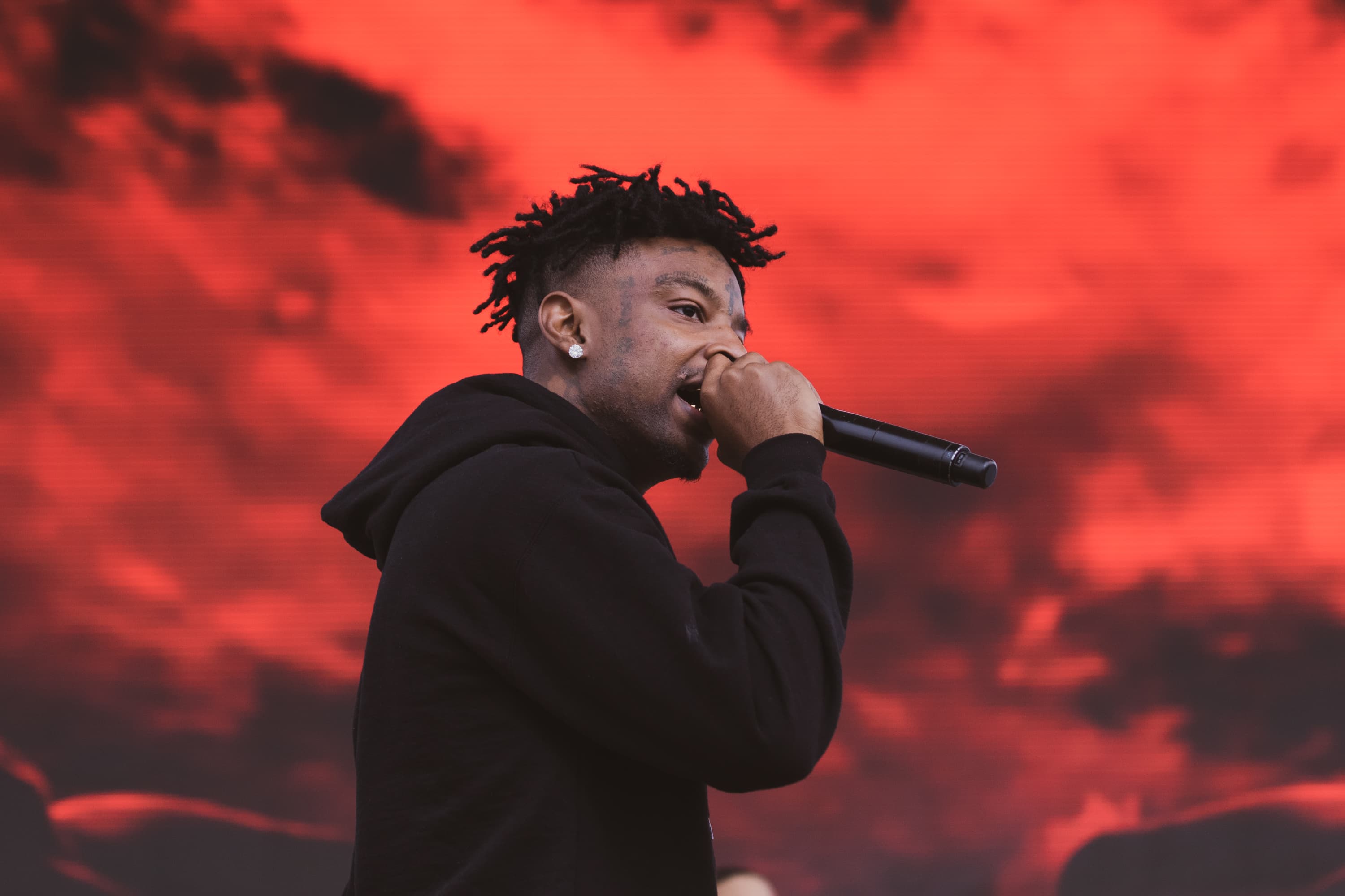 21 Savage performs at the annual fall Juice Jam at Skytop Field on Sunday.