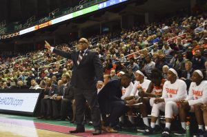 Syracuse head coach Quentin Hillsman coaches from the sidelines against Notre Dame at the ACC Women's Tournament on March 9, 2019.