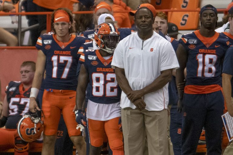 Dino Babers watches from the sideline.
