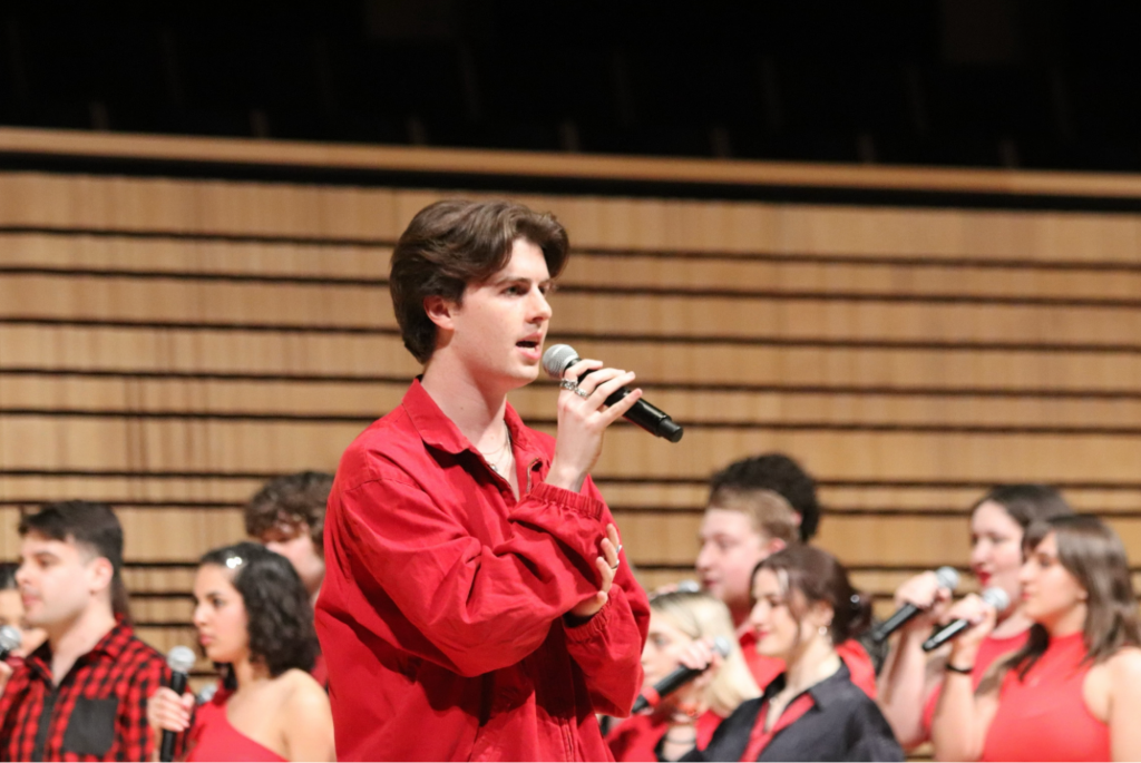 Griffin O'Neill sings a solo during the ICCA quarterfinals