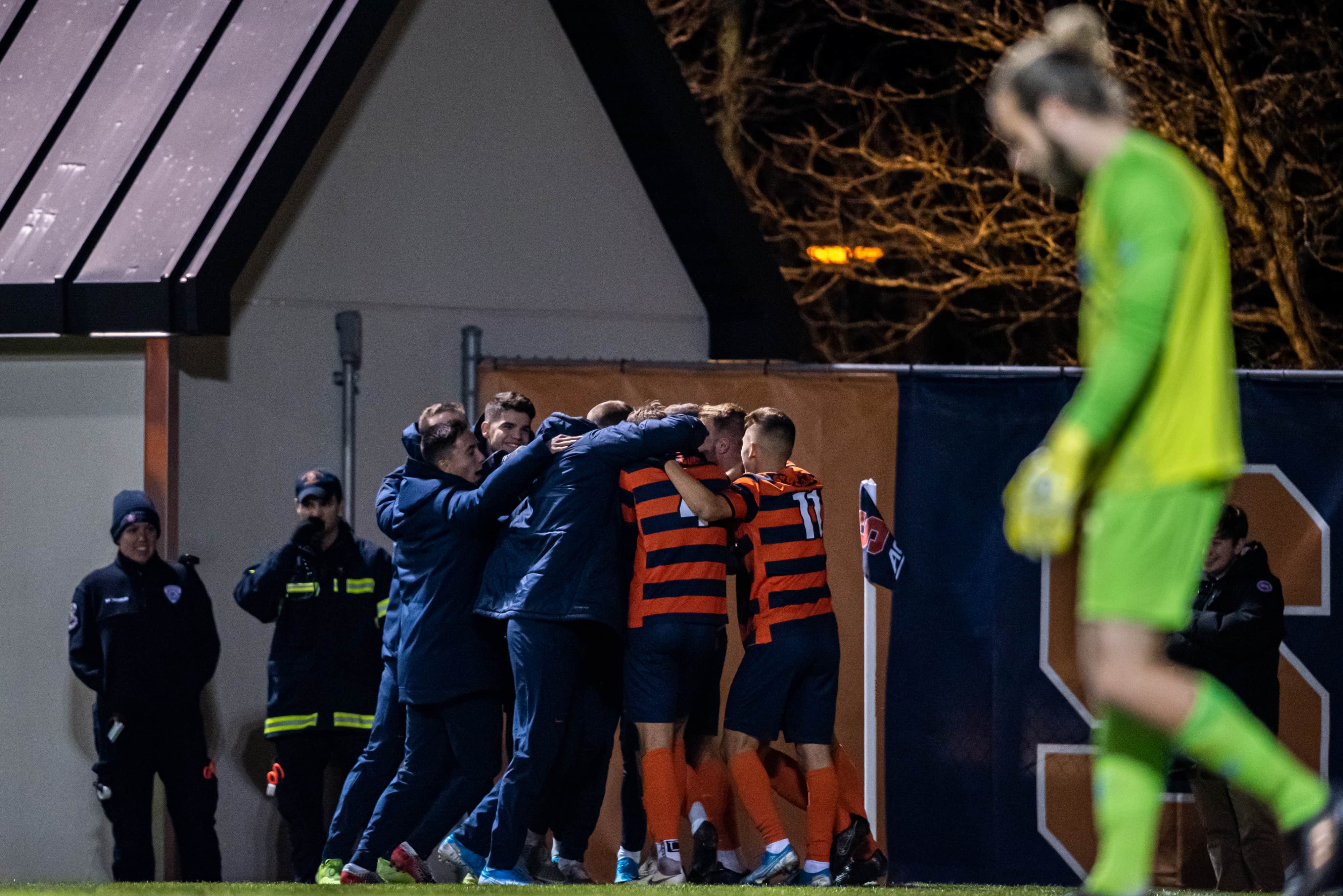 The Syracuse soccer team celebrates after scoring their third goal against Rhode Island during the first round of the NCAA Men’s Soccer Tournament. Syracuse defeated Rhode Island 3-2.