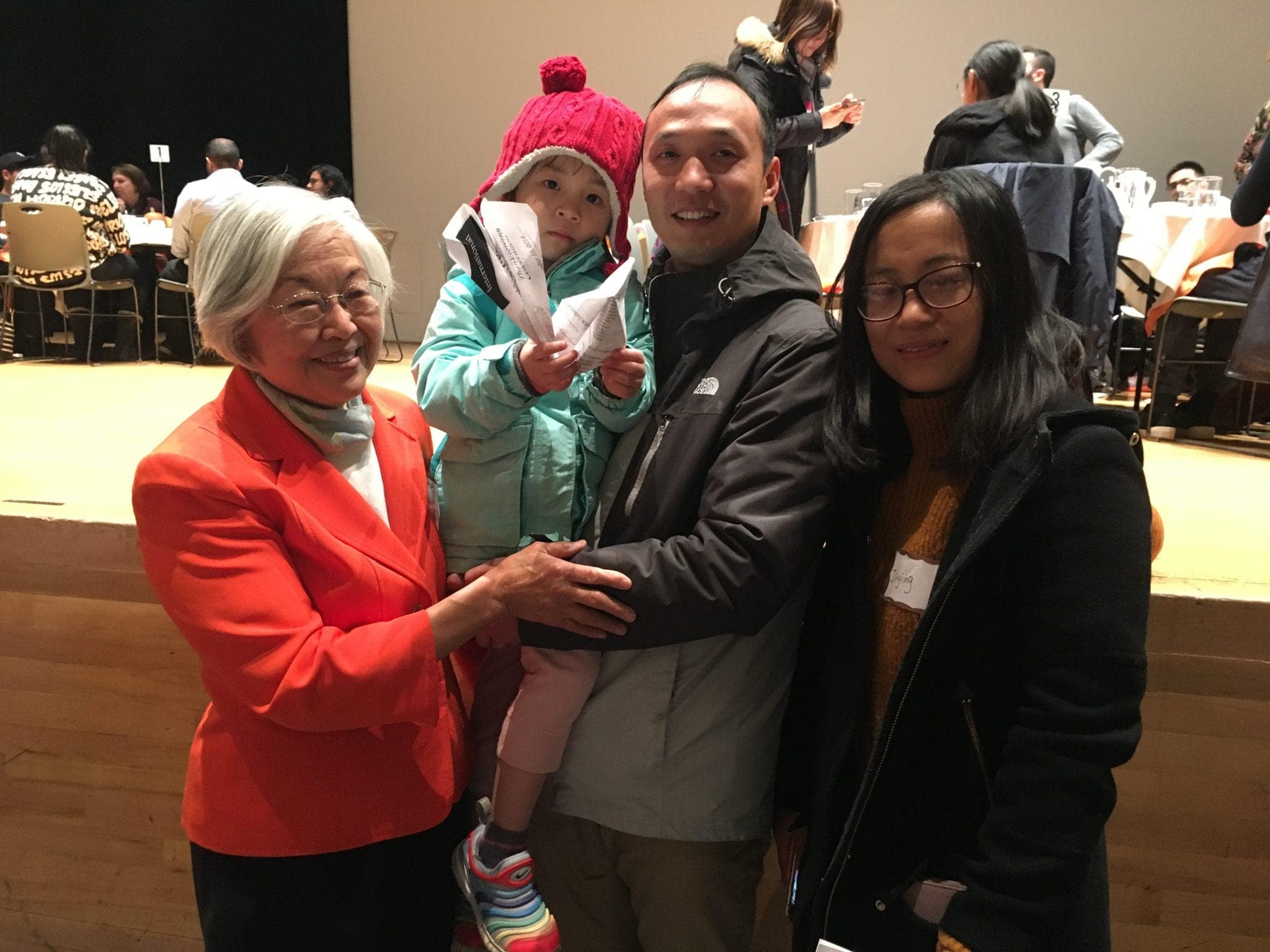 Ruth Chen meets with the family of a Syracuse University student at the 34th International Thanksgiving Dinner on Nov. 15, 2018.
