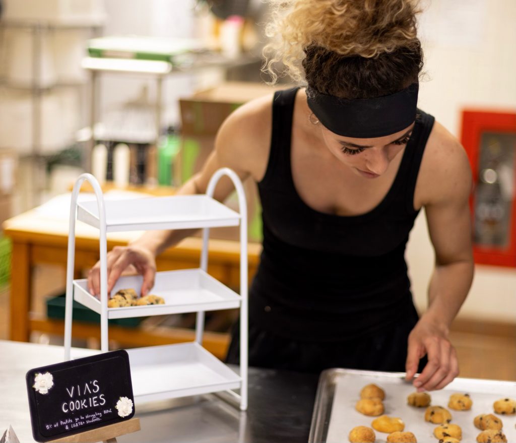 Via Carpenter prepares cookies for her business, Via’s Cookies in Ithaca.
