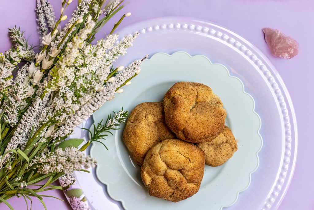 Cookies sit on a decorated plate inside bakery, Via's Cookies.