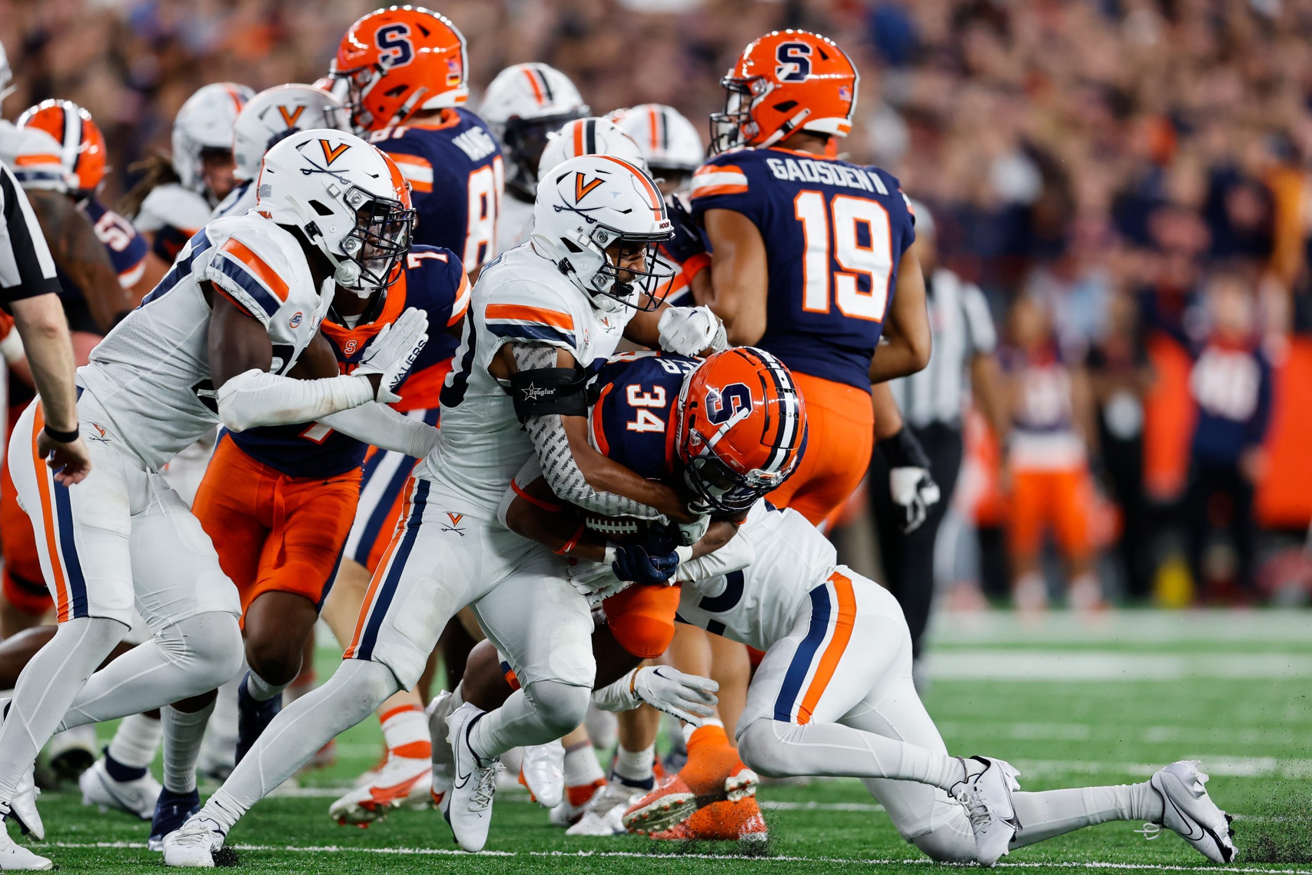 SYRACUSE, NY - SEPTEMBER 23: Sean Tucker #34 of the Syracuse Orange rushes the ball against the Virginia Cavaliers at JMA Wireless Dome on September 23, 2022 in Syracuse, New York. Tucker rushed for 60 yards on 21 carries. (Photo by Isaiah Vazquez)