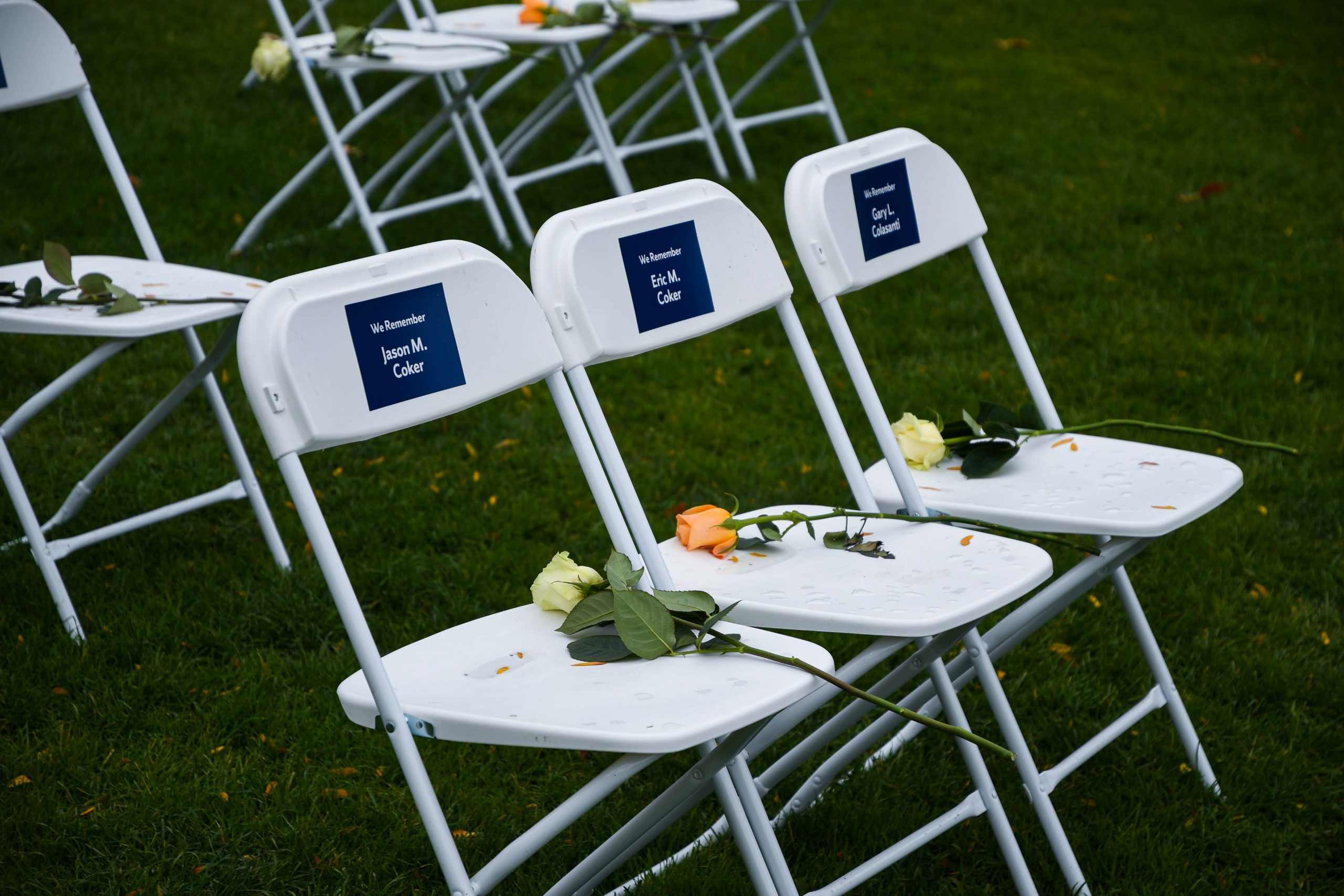 Flowers rest on seats on the quad during Remembrance Week.