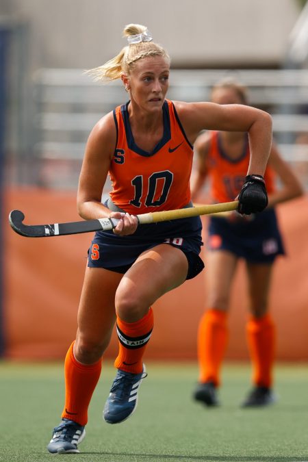 SYRACUSE, NY: Charlotte de Vries #10 of Syracuse Orange moves against the Columbia Lions during a field hockey game at J.S. Coyne Stadium on September 4, 2022.