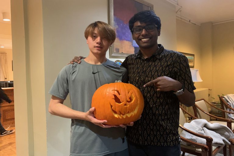 Paul and a student at a Halloween event at SU’s Center for International Services in 2019.