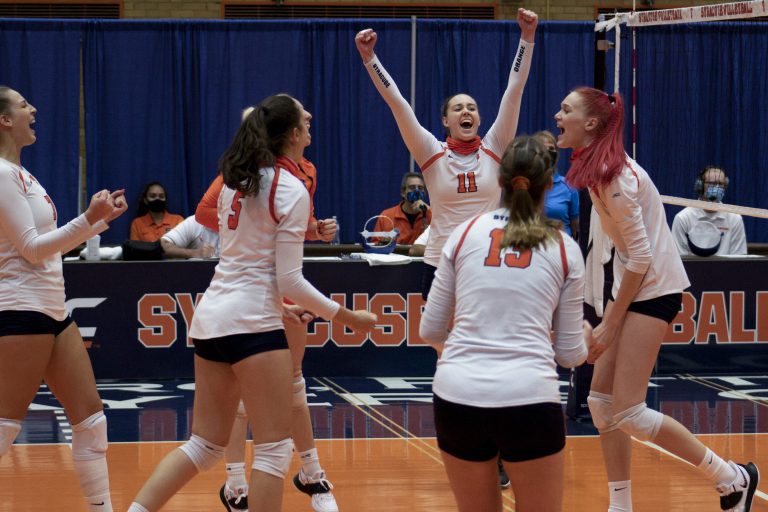Polina Shemanova (11) and teammates celebrate during Syracuse's match on Sept. 25, 2020, vs. Pittsburgh.