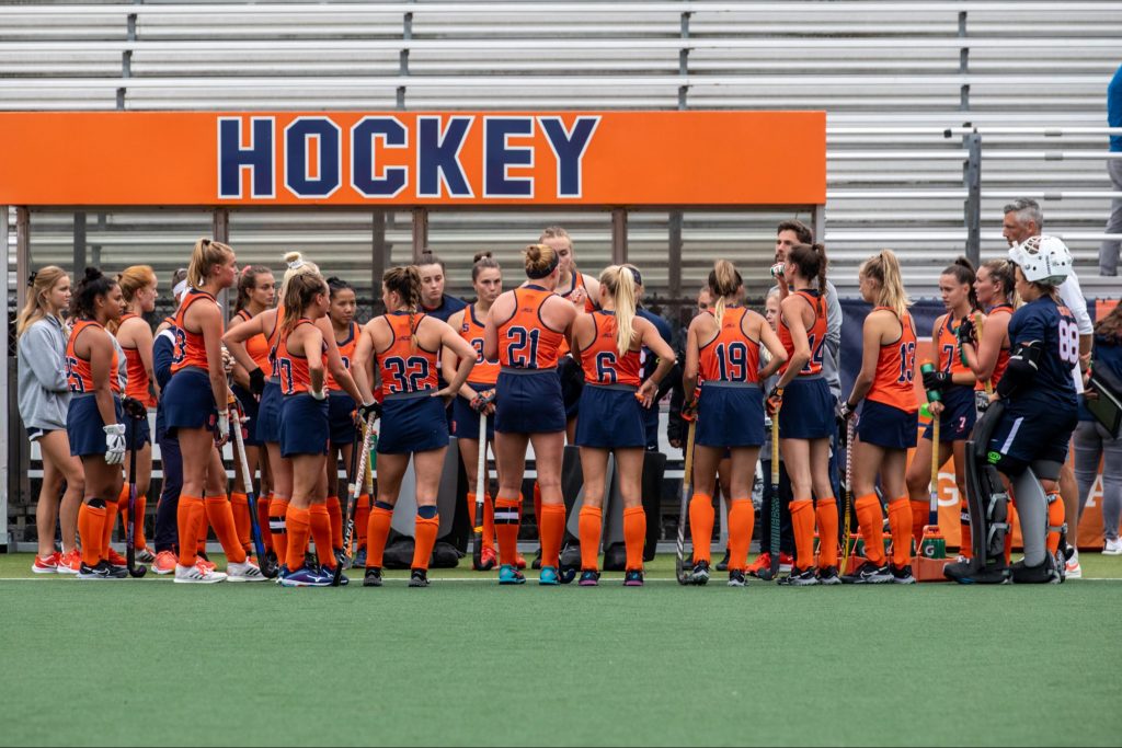 Syracuse Field Hockey players huddle during a game on Friday, September 16, 2022.
